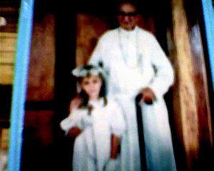 faded image of my sister's First Communion in the Philippines. 