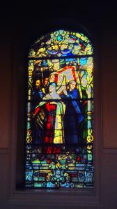 Window in St .Louis Cathedral showing the Crusader saint's body being borne back when he died after launching a great war against Islamists who were terrorizing local Christians and others.