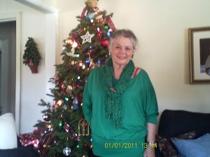 Mom with a Christmas tree in a previous year. Today she is scheduled to buy a tree.